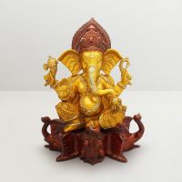 Pure Divine Ganesha Sitting On Elephant Trunk Base Yellow