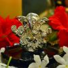 AG_Small_Ganesha_On_Round_Wooden_Lo.jpg