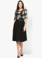 MIAMINX Black Colored Printed Skater Dress With Belt