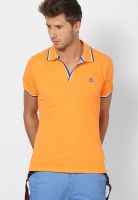 United Colors of Benetton Orange Solid Polo T-Shirts
