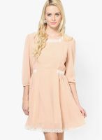 Besiva Peach Colored Solid Skater Dress