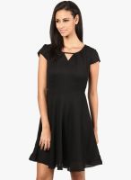 The Vanca Flared Dress In Black Color With A Cut Out Detailing At Neckline-Short Sleeves