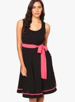 Tops And Tunics Black Colored Solid Skater Dress