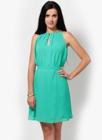 Tops And Tunics Green Colored Solid Skater Dress