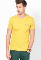 United Colors of Benetton Yellow Solid Round Neck T-Shirts