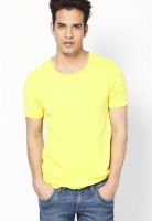 United Colors of Benetton Yellow Solid Round Neck T-Shirts