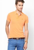 United Colors of Benetton Orange Solid Polo T-Shirts