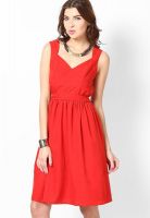 Tops And Tunics Red Colored Solid Skater Dress