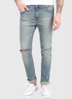 Incult Skinny Jeans In Mid Wash With Knee Rips
