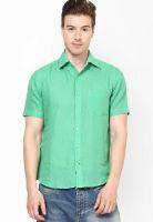 The Vanca Solid Green Regular Fit Casual Shirt