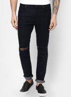 Incult Skinny Jeans In Rinse Wash With Knee Rips