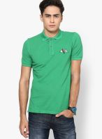 United Colors of Benetton Green Solid Polo T-Shirts