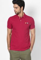 United Colors of Benetton Magenta Solid Polo T-Shirts
