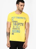 United Colors of Benetton Yellow Solid Round Neck T-Shirts