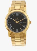 Titan Karishma 1644Ym04 Golden/Black Analog Watch