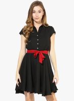 The Vanca Black Colored Solid Skater Dress